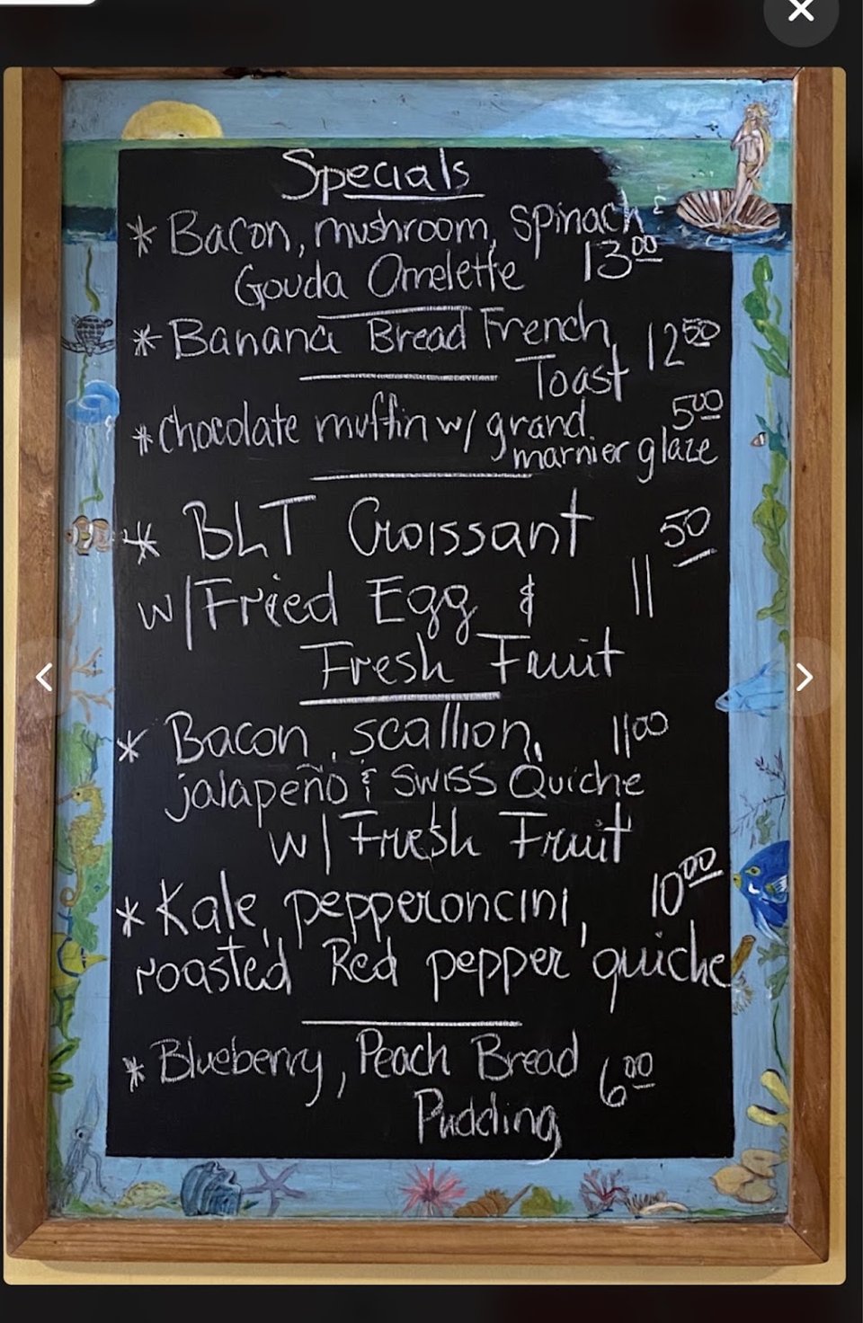 Breakfast menu with biscuits and omelets.